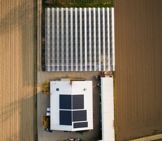 aerial-view-of-field-greenhouse-and-house-with-so-2023-11-27-05-30-05-utc